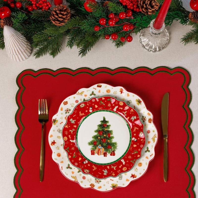 Elegant dining setting with Lenox china, gold cutlery, white tablecloth, crystal glasses, soft overhead lighting.