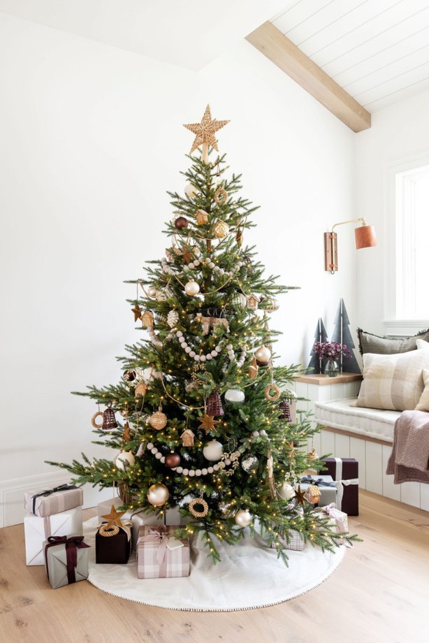 Living room, metallic gold accents, champagne velvet sofa, crystal ornaments, sparkling fairy lights.