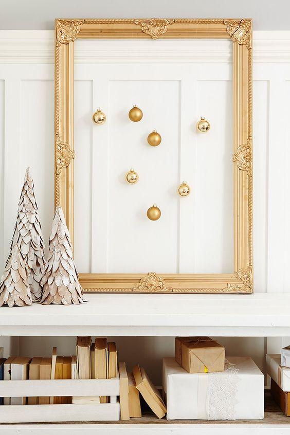 Bedroom interior styled with ochre yellow bedding, mini gold christmas tree, and warm bedside lamps.