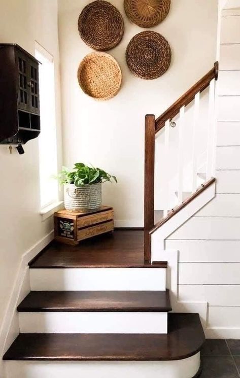 Modern stair landing with sleek bench, black accents, and minimal decor, clean lines