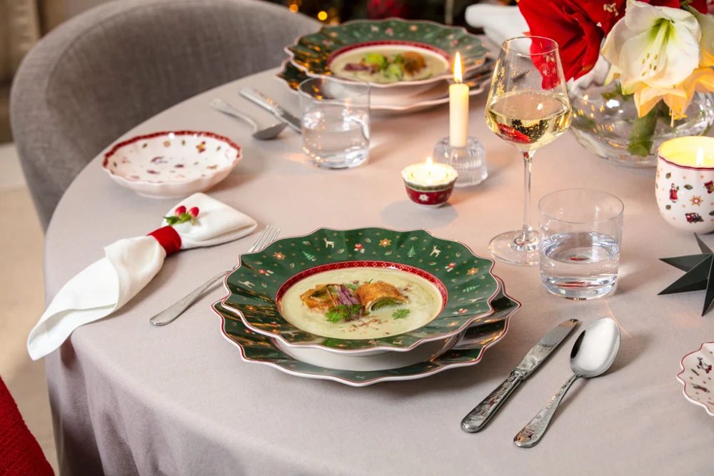 Festive christmas china pattern showcasing delicate woodland deer illustrations on ceramic dinnerware.