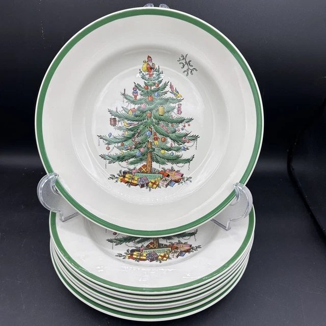 Playful christmas china pattern with red and white candy cane striped edges.