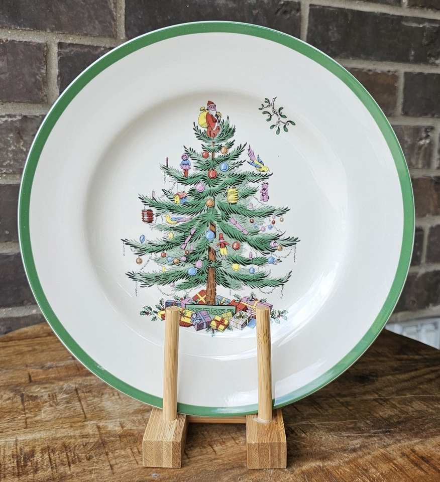 Vibrant christmas china pattern featuring large, realistic poinsettia flower illustrations.