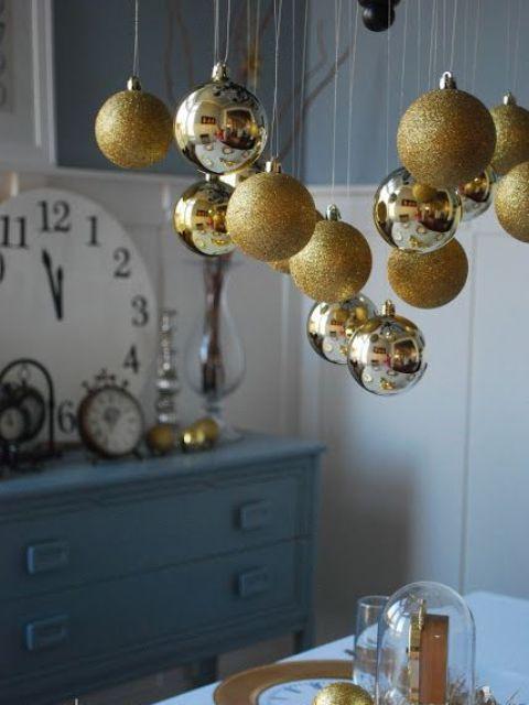 Foyer bench styled with gold christmas decor, faux fur, and gold accent pillows.
