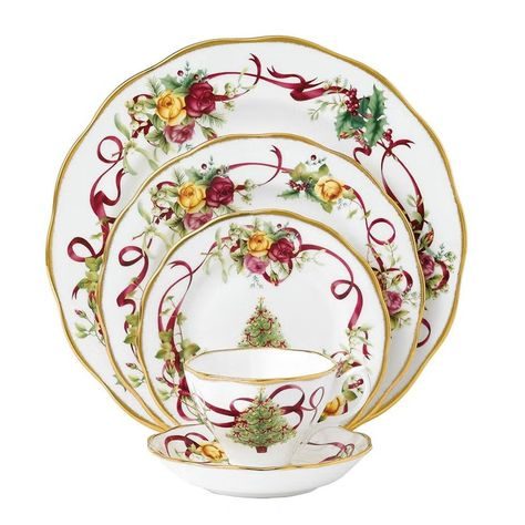 Beautiful christmas china pattern showing bright red cardinals perched on snowy branches.