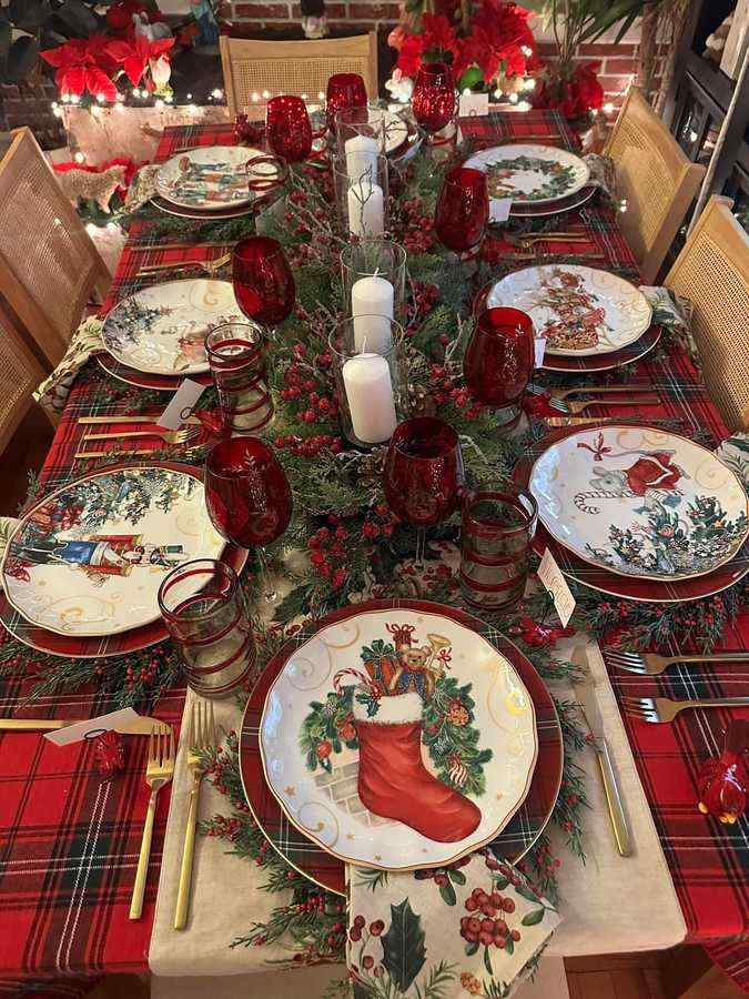Modern christmas china pattern featuring gold celestial stars on a deep blue sky background.