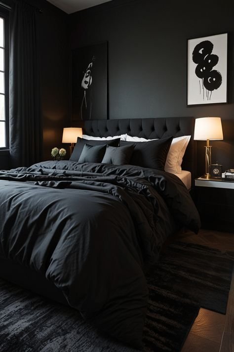 Dark bedroom featuring a tufted leather headboard, twin table lamps, brushed steel side tables, and layered linen bedding.
