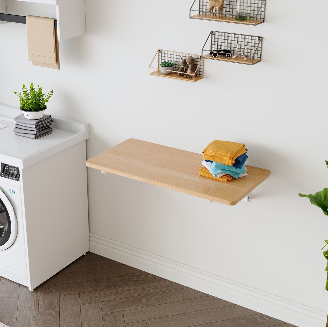 Contemporary charcoal grey laundry room with matte black fixtures, concrete countertops, modern strip lighting.