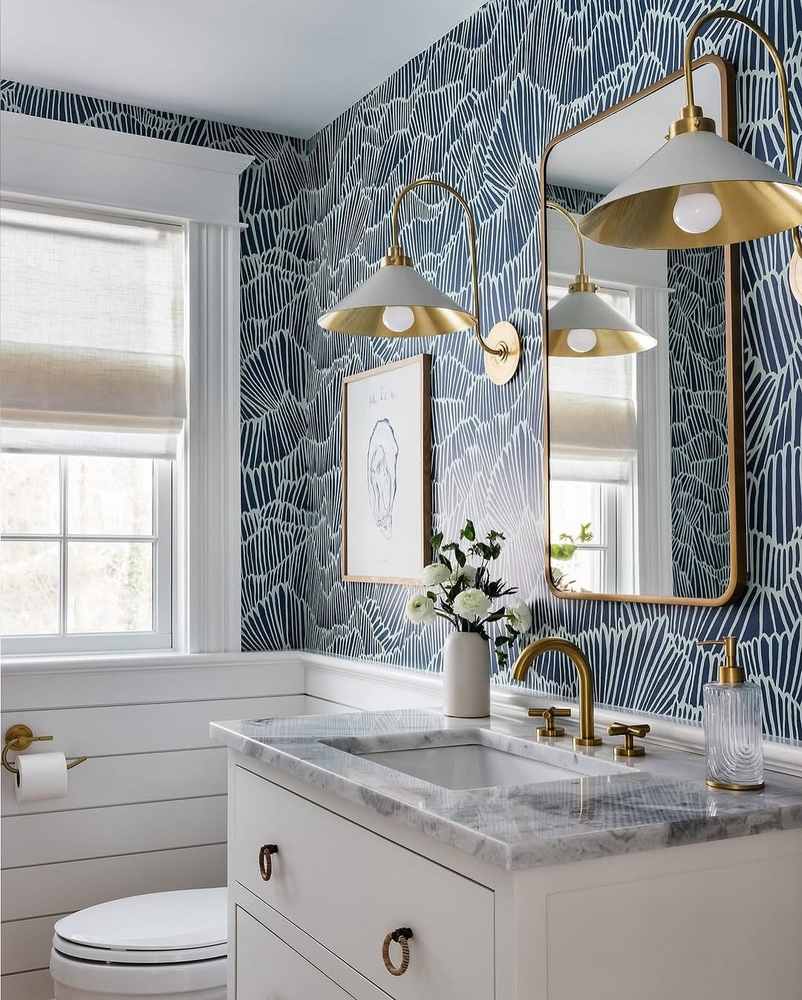 Ultra clean frameless glass walk in shower warm gray large format tiles hidden drain ceiling shower.