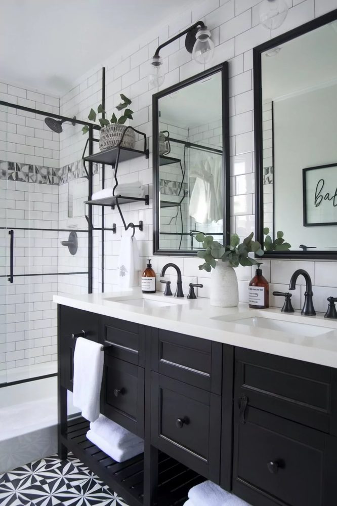 Warm sand plaster bathroom walls ochre accent towels stone soaking tub soft indirect cove lighting.