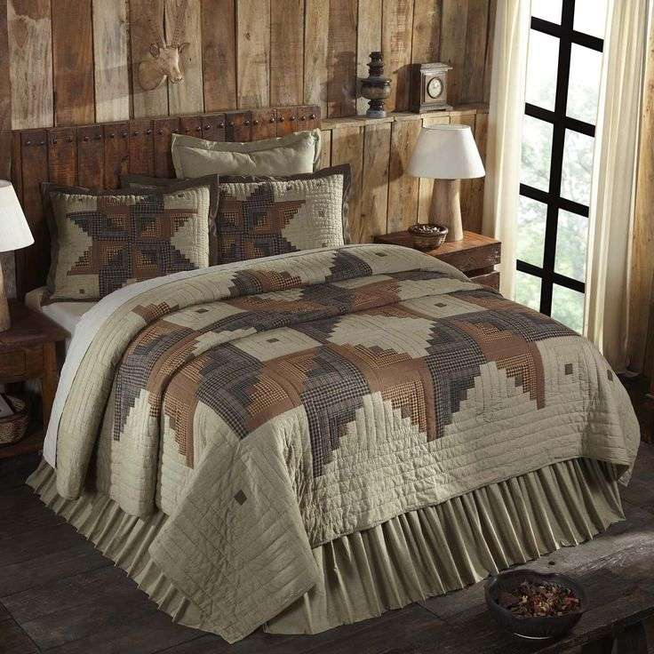Boho bedroom showcasing mustard yellow quilt, charcoal sheets, woven rattan lighting, and warm wood.