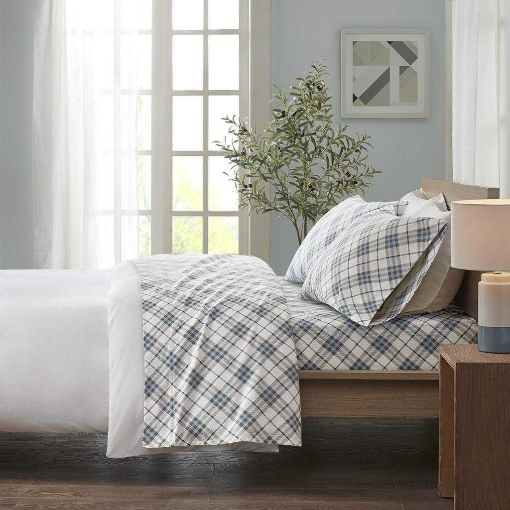 Mid-century modern bedroom featuring mustard yellow bedding set, walnut bed, warm mid-century globe pendant light.