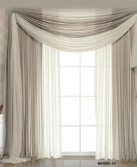 Grey curtains with subtle silver metallic threading in a sophisticated bedroom.