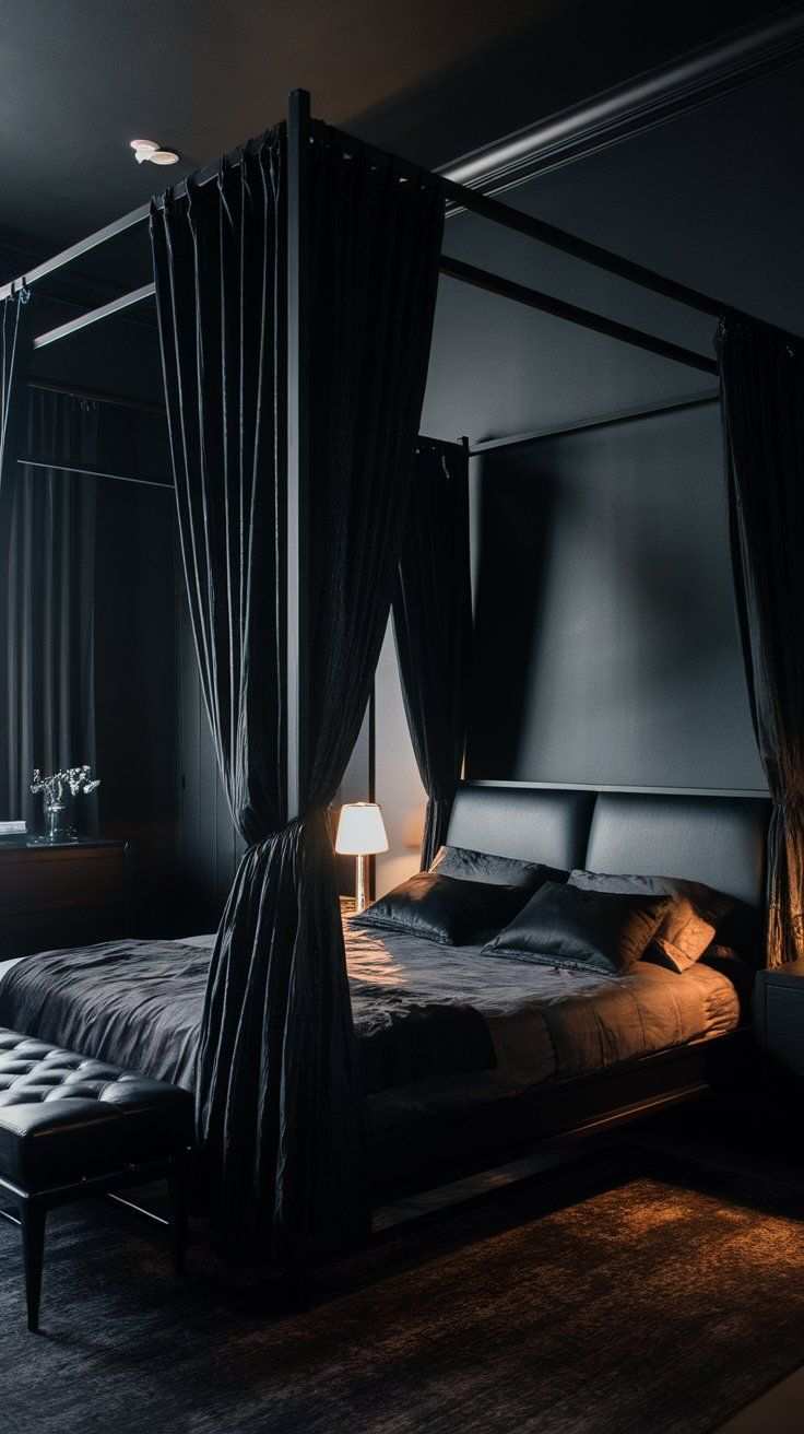 Black canopy bedroom featuring floor‑to‑ceiling draped curtains, a tufted bench, and soft ambient lighting.