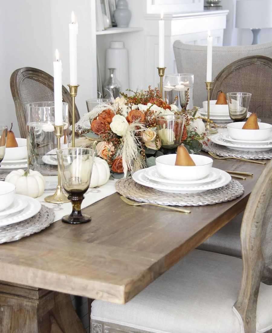 Country dining room, white ceramic plates, pear fruit centerpiece, natural linen napkins, soft daylight