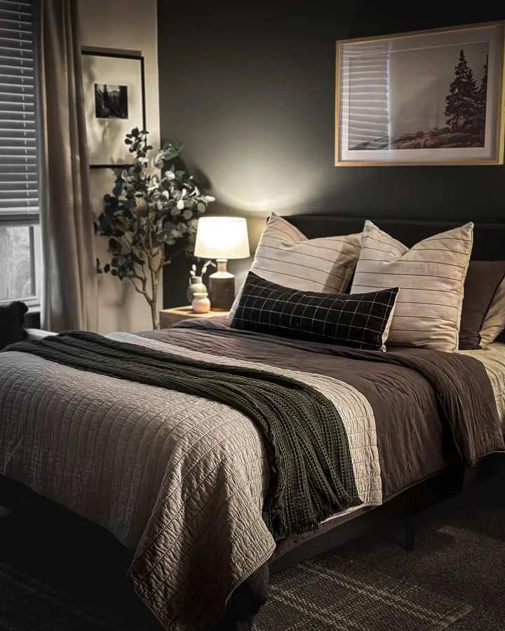 Charcoal bedding beneath soft ambient lighting, creating a relaxed, night‑time atmosphere.