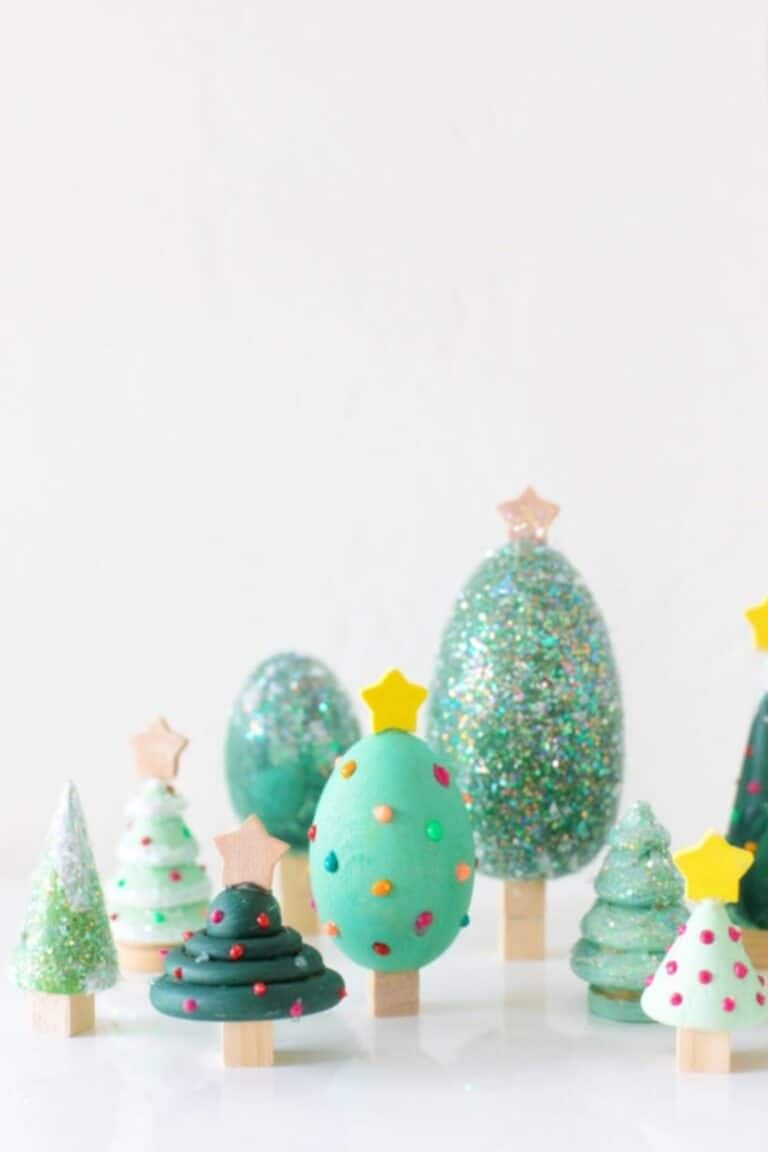 Bookshelf display with mini colorful bottle brush trees, small gifts, warm lighting.