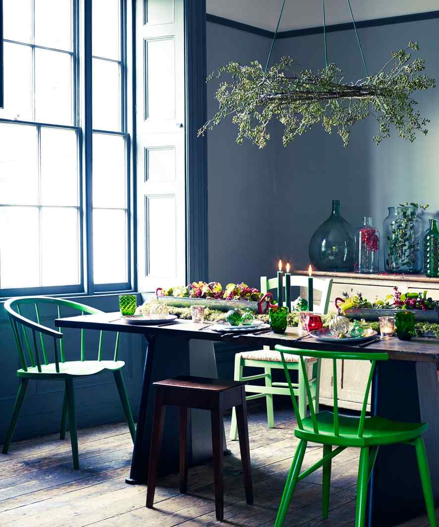 Patio with cobalt blue chairs, white table, bright sunlight