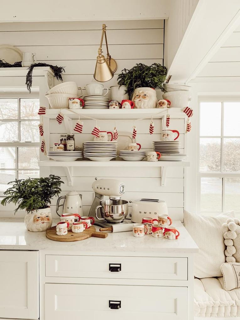 Kitchen with matte white cabinets, silver misted glass shelves, frosted ornaments, soft white lighting, ethereal look