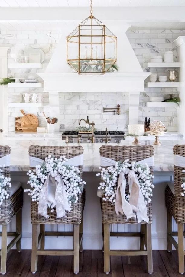 Kitchen with walnut cabinets, pine‑cone crown knobs, natural wood grain, warm amber lighting, rustic holiday vibe
