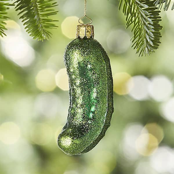 A welcoming entryway console styled for the holidays with a hidden pickle ornament.