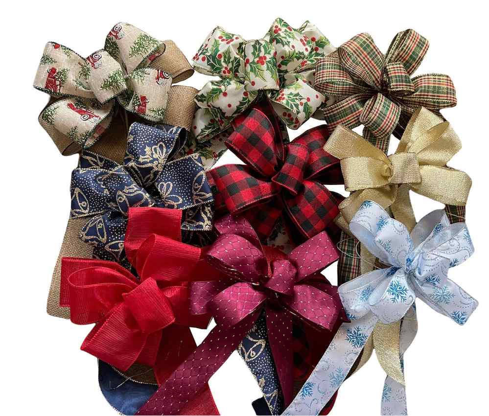 Tartan plaid ribbon bow attached to pinecone wreath mounted on reclaimed wood wall paneling