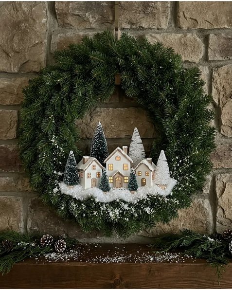 Christmas village wreath with tiny houses on wooden door