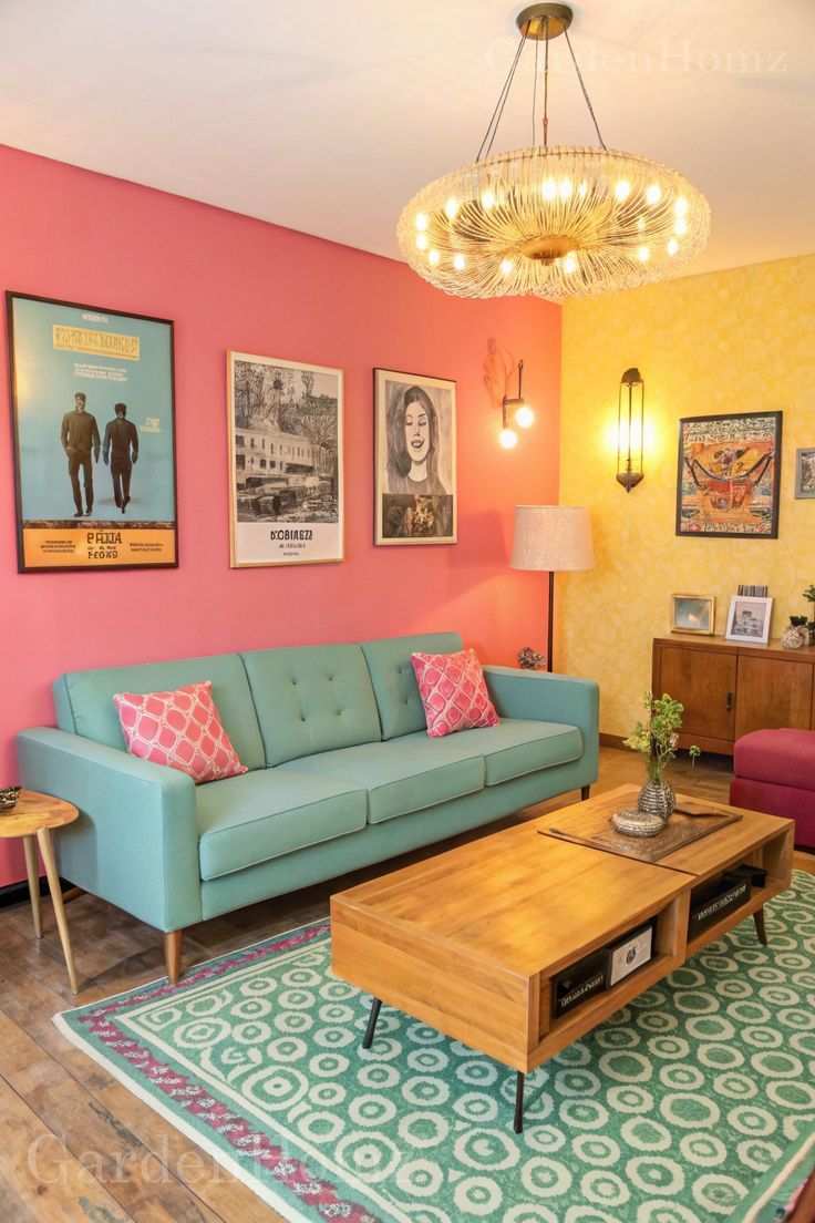 Modern living room with coral sofa, mint green walls, and gold accent decor.