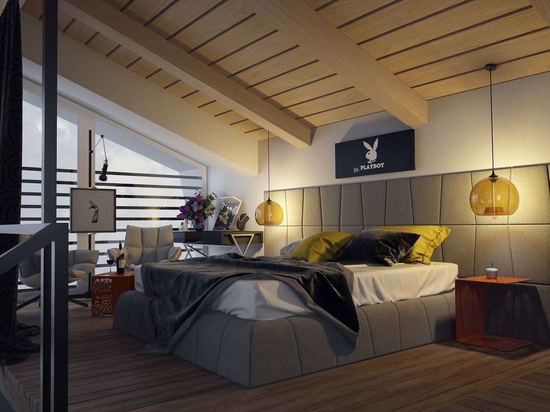 Dark master bedroom featuring moody charcoal walls, brushed brass fixtures, deep velvet accent pillows, warm amber glow.