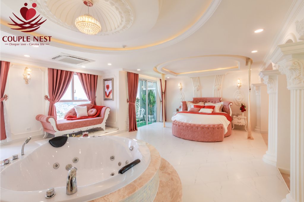 Romantic master bedroom featuring dusty blush duvet, warm ivory padded headboard, glass sconces, soft ambient illumination.
