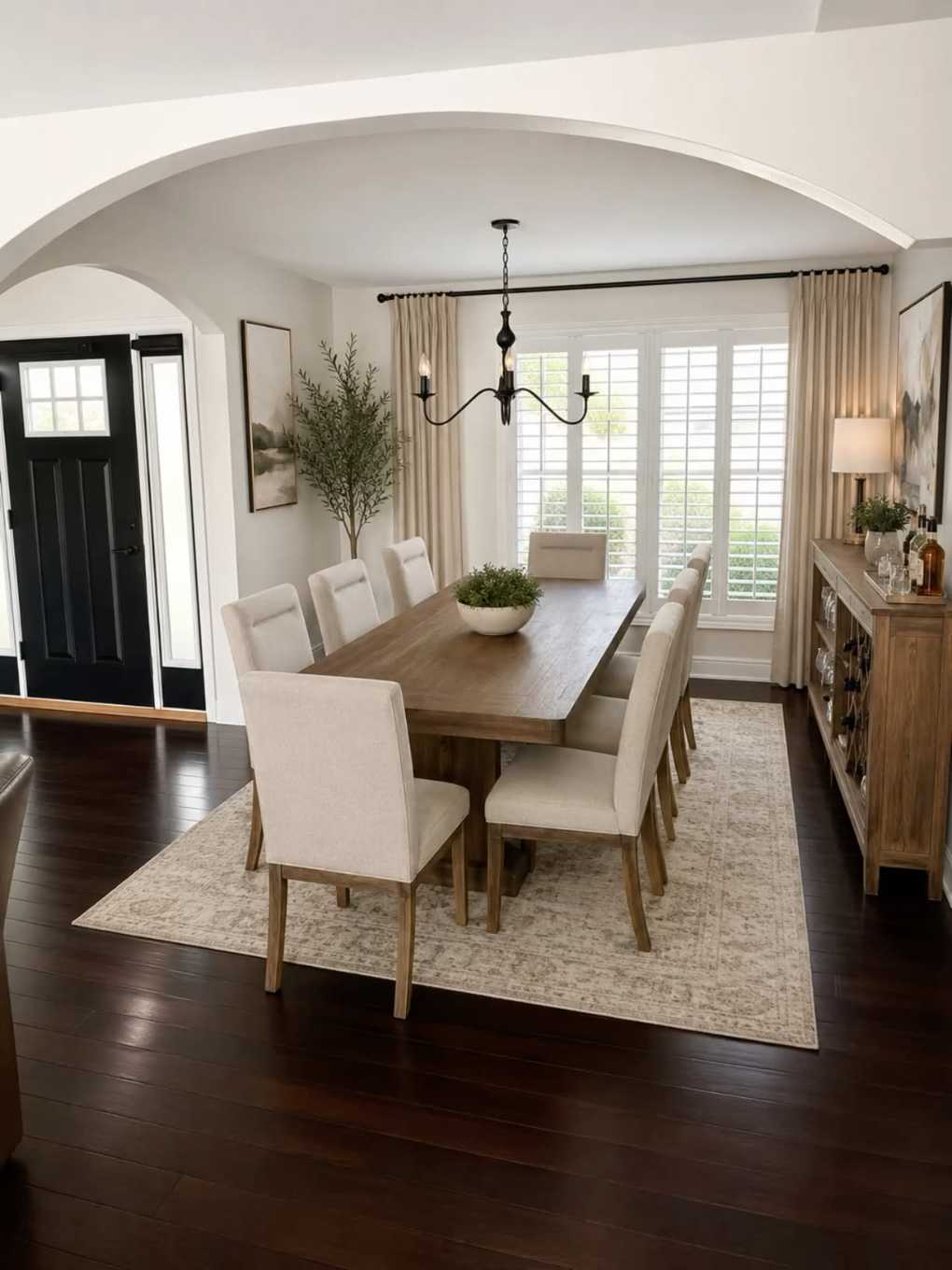 Dining room with traditional arched doorway