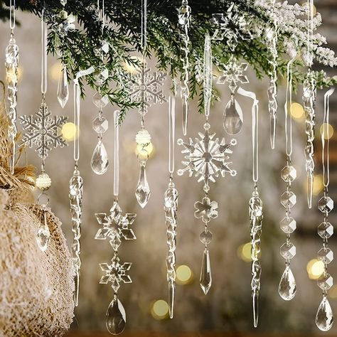 Royal sapphire blue gem christmas tree displayed on light oak mantle with cozy warm fireplace light