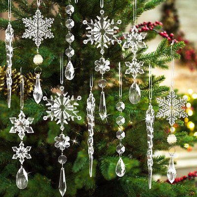 Champagne glass gem christmas tree resting on brushed gold tray with soft golden glowing lighting
