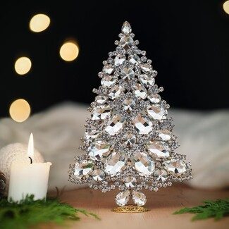 Home office desk with light ash wood, white alabaster gem tree, gold desk lamp, soft light