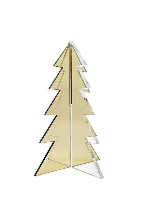 Contemporary foyer console table with emerald green gem Christmas trees, white oak accents, and soft warm light.