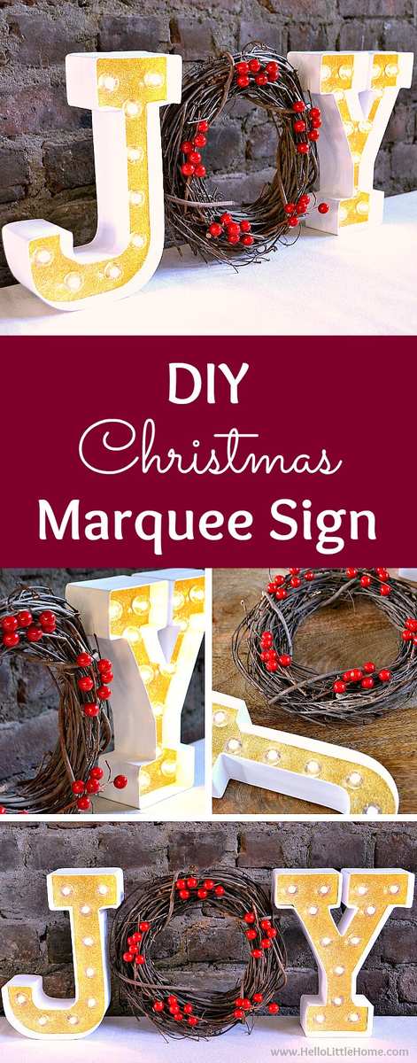 Living room mantel with wooden JOY marquee lights, pine garland, and warm golden glow.