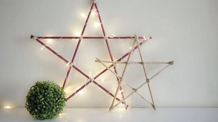 Entryway console table with dark green velvet stars brass mirror warm soft ambient lighting