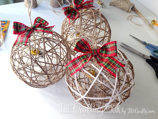 Creative artist studio featuring wooden easel, marbled glass ornaments, dynamic warm track lighting daylight