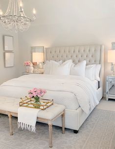Elegant master bedroom refresh with updated bedding, art, and lighting fixtures