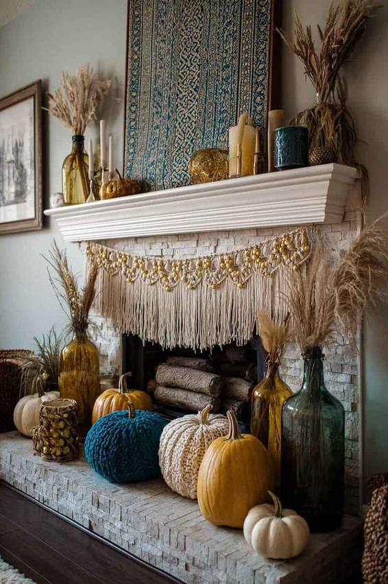 A rustic mantel adorned with branches wrapped in velvet ribbon and small glass bottles.