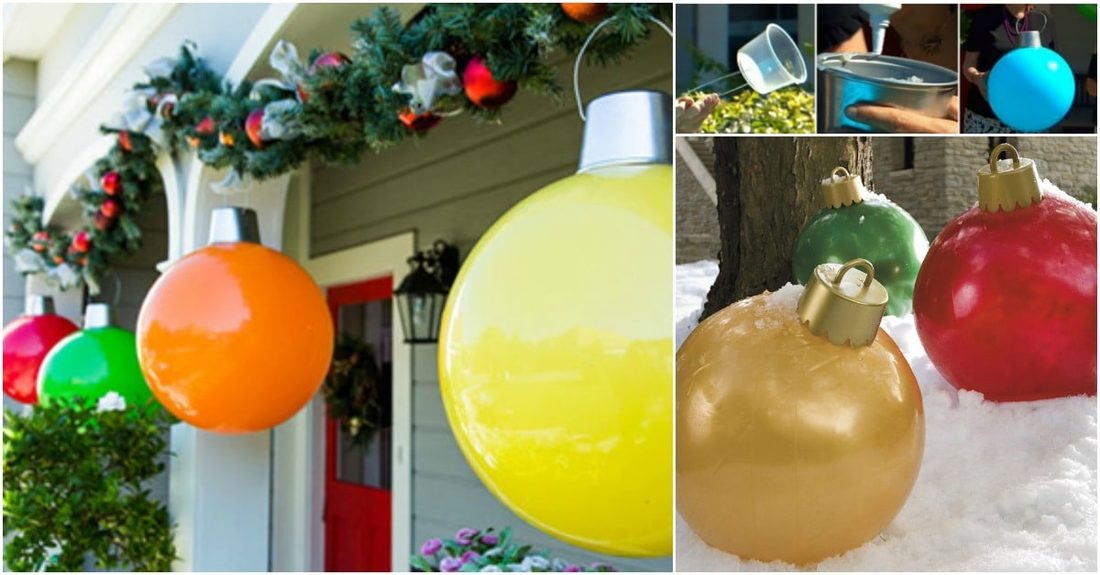 Large, oversized outdoor christmas decorations shaped as ornaments placed in a garden bed.