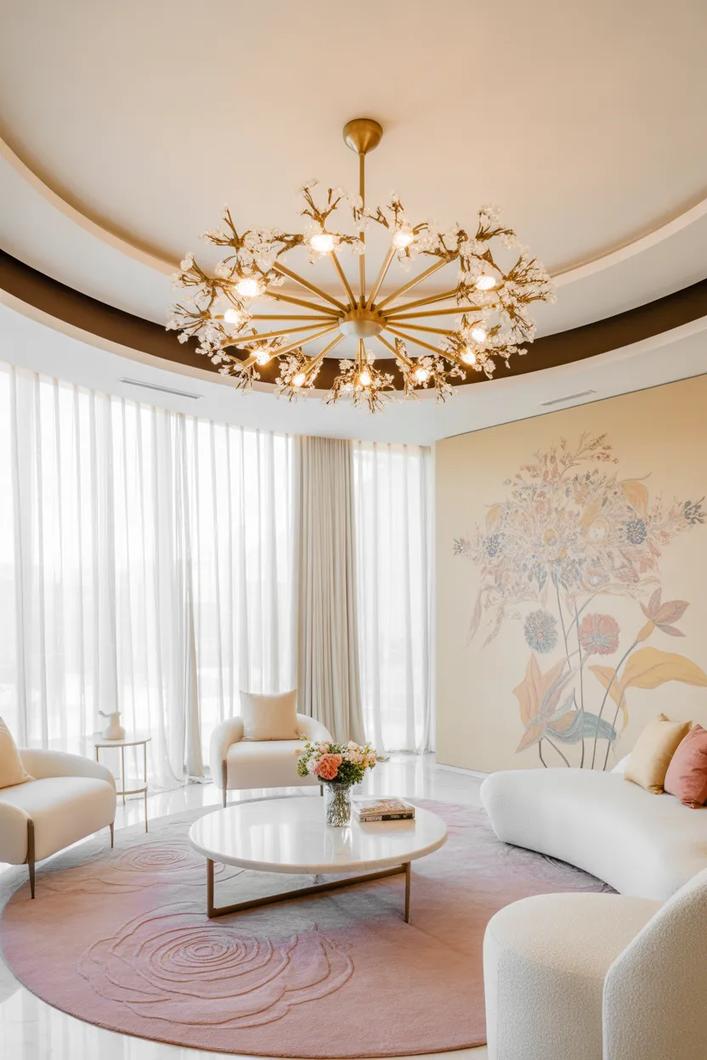 Teal accent wall, full mirror wall, white sofa, and bright living room lighting.