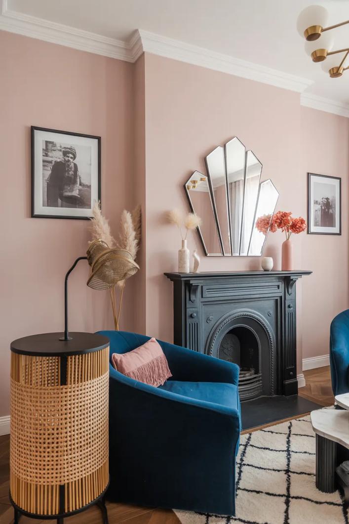 Terracotta clay pot, neutral sofa, white walls, and bright living room light.
