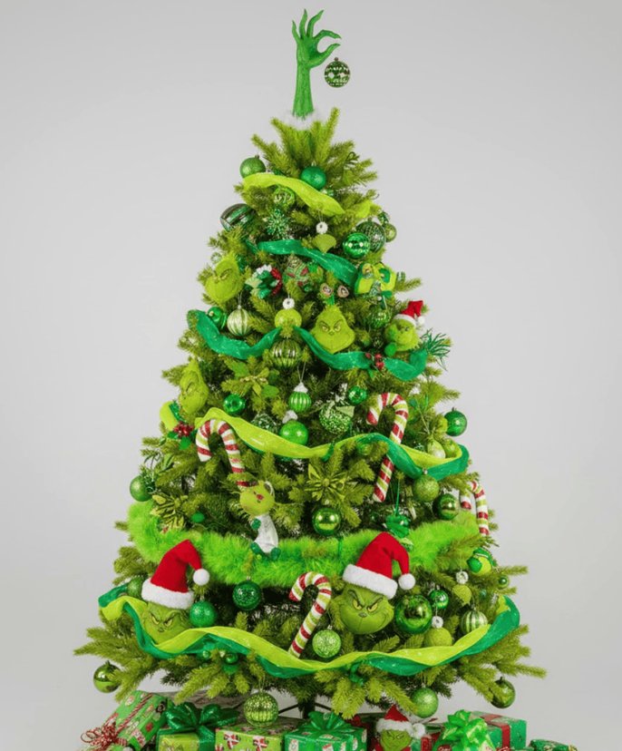 Tree with multiple small green Grinch face ornaments in a bright room