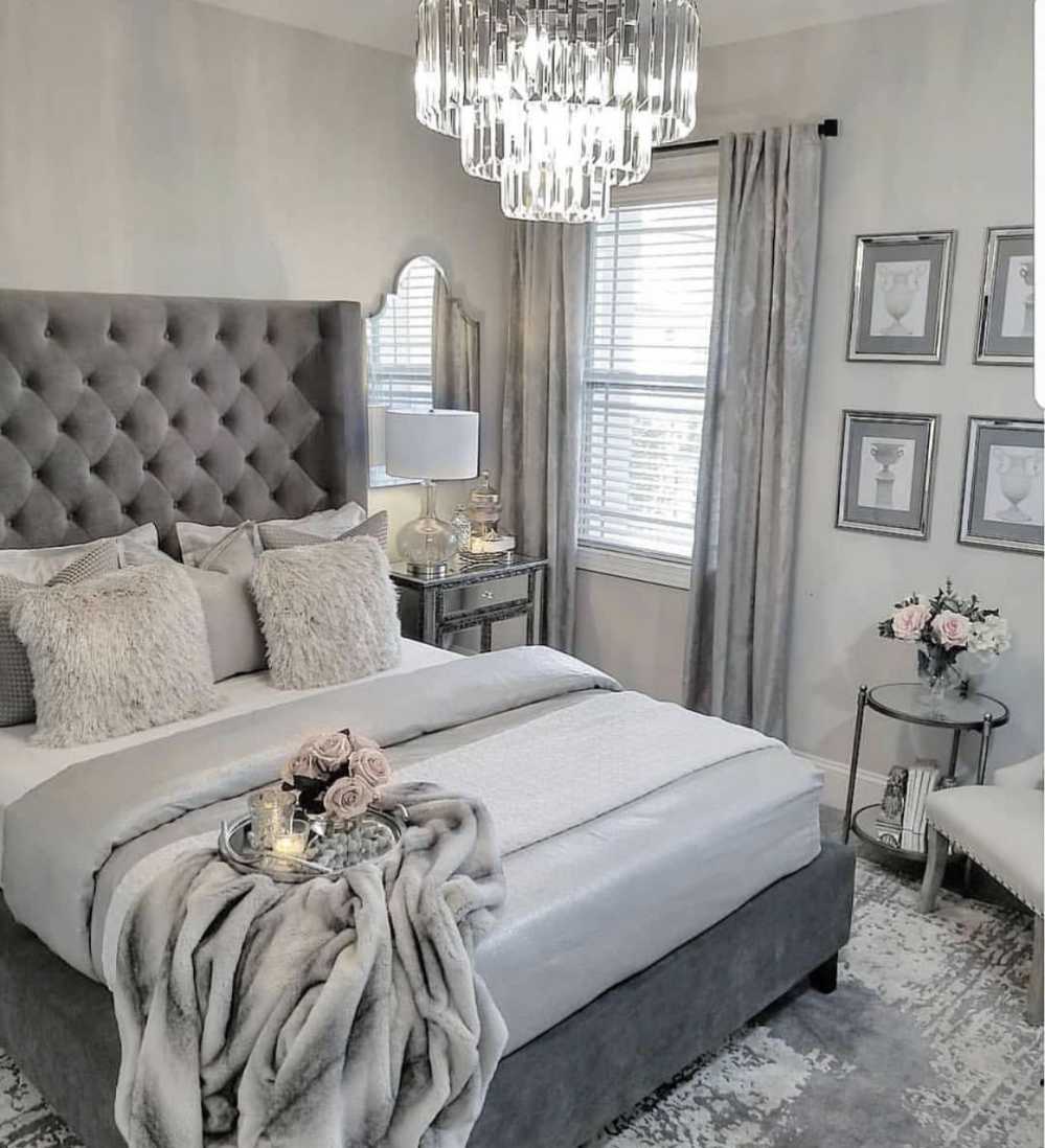 Master bedroom with grey and white decor and crisp modern lines