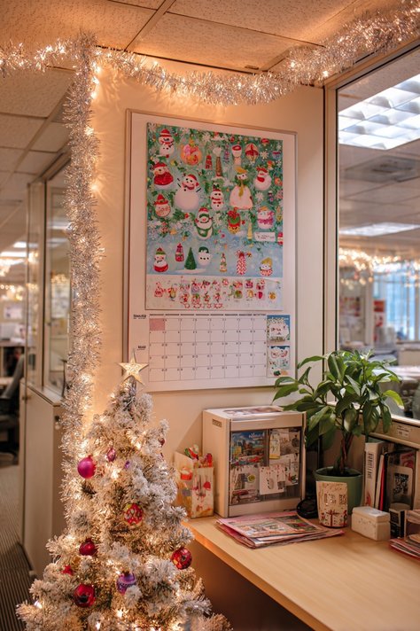 A framed vintage-style advent calendar poster hanging on a gray office wall.