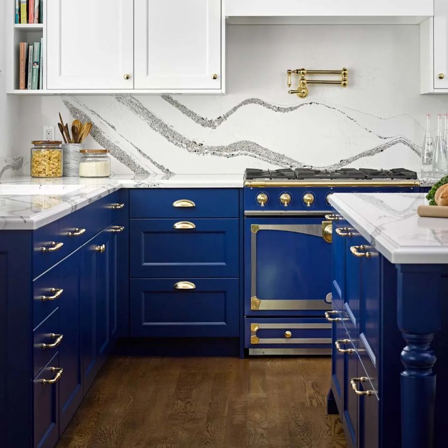 Modern concrete-finish kitchen cabinet ideas with black metal accents and pendant lighting