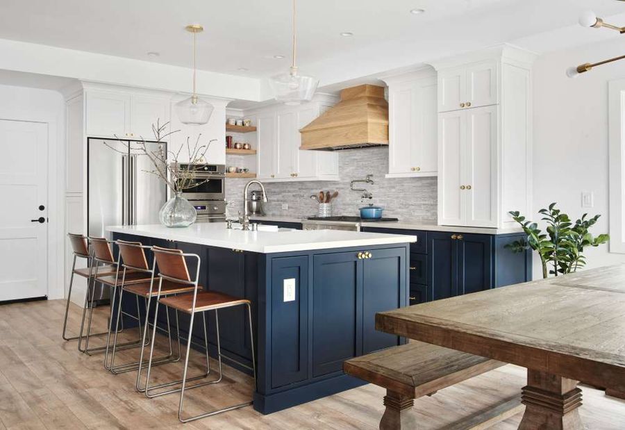 Deep charcoal kitchen cabinet ideas with gold handles and large kitchen island
