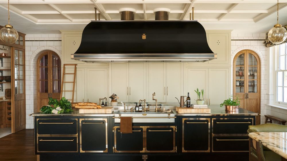 Elegant kitchen cabinetry with fluted wood details on the island and cabinet doors.