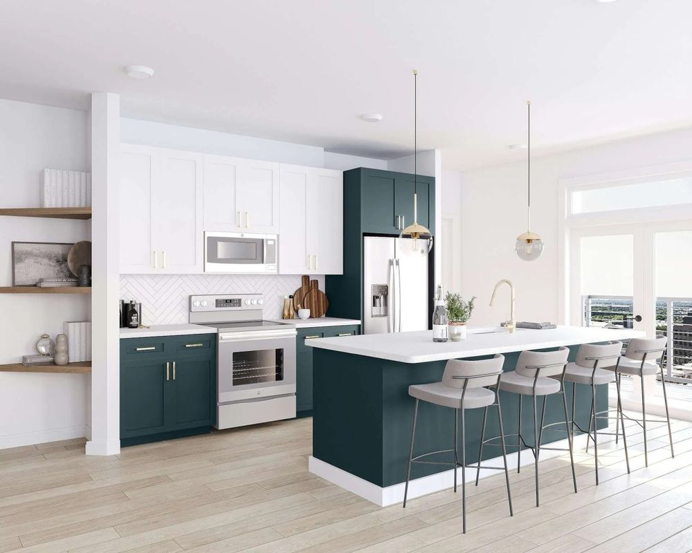 Dramatic kitchen with navy blue cabinets, dark wood flooring, and gold accents.